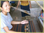 Miss Sun with Ki (loom) Kasuay (weaving shuttles), Ban Don Kho