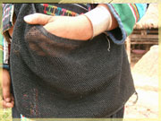 Vine string bag and silver cuff in Ban Nammat Mai