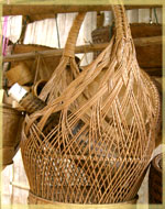 Coconut midrib handbag with woven bottle cover inside, Ban Som